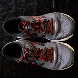NEW BALANCE grey and red running shoes. Men's Size 10
